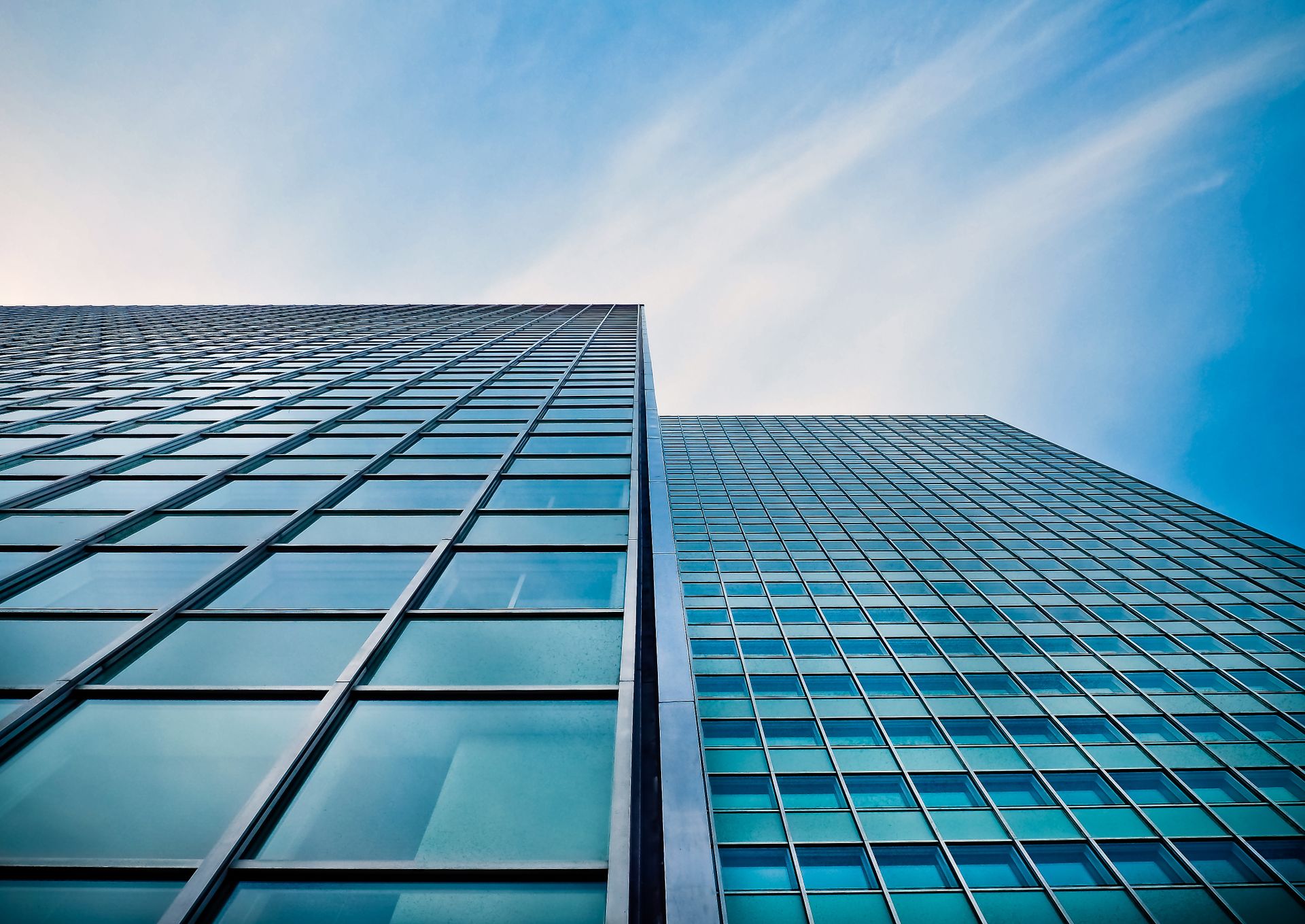 Glass office towers viewed from below